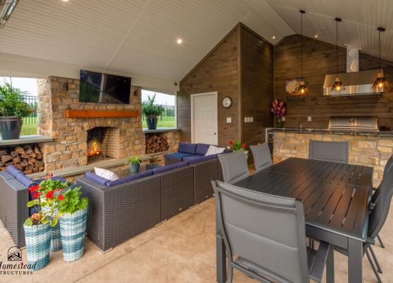 Under the pavilion of a 20' x 25' A-Frame Avalon Pool House with Outdoor Kitchen in Limerick, PA