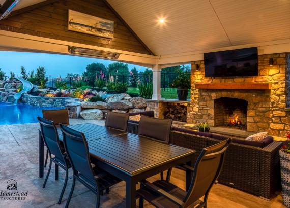 Under the pavilion of a 20' x 25' A-Frame Avalon Pool House with Outdoor Kitchen in Limerick, PA