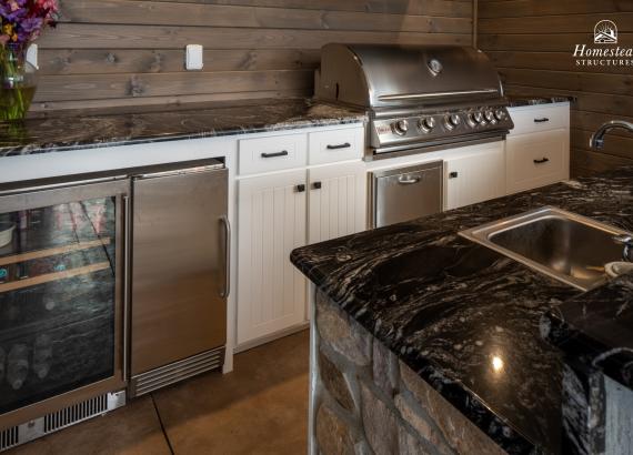 Shot of outdoor kitchen with Everlast cabinets in a 20' x 25' A-Frame Avalon Pool House with Outdoor Kitchen in Limerick, PA