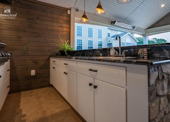 Shot of outdoor kitchen with Everlast cabinets in a 20' x 25' A-Frame Avalon Pool House with Outdoor Kitchen in Limerick, PA