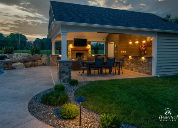 Twilight shot of a 20' x 25' A-Frame Avalon Pool House with Outdoor Kitchen in Limerick, PA