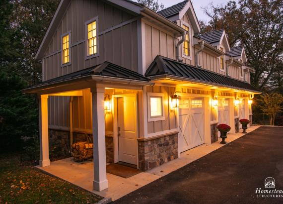 Twilight photo from the side of  21' x 43' 3-Car Garage in Wayne PA with 2nd floor Gym & Living Space