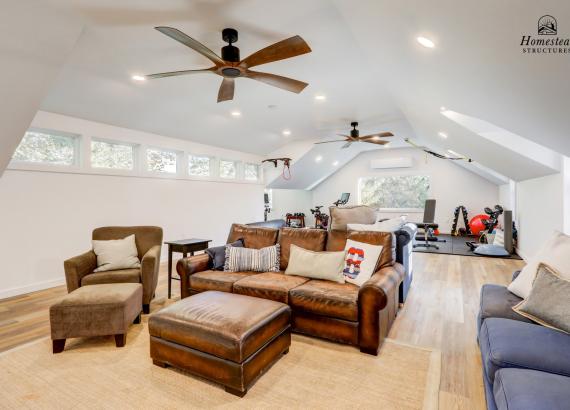 Interior photo of 2nd floor Living Space in 21' x 43' 3-Car Garage in Wayne PA with gym