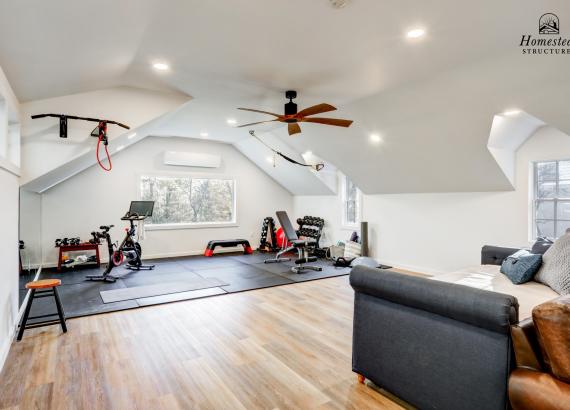 Interior photo of 2nd floor Living Space in 21' x 43' 3-Car Garage in Wayne PA with gym