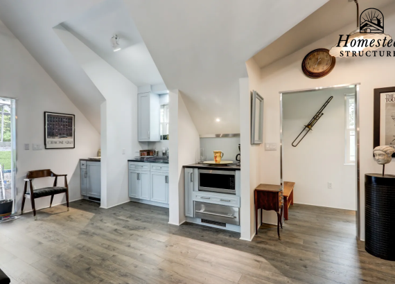 Close-up view of a modern kitchen in a two-story custom garage, highlighting high-end finishes and functional design