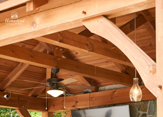 Close-up of the mortise and tenon joints underneath the pavilion with lights.