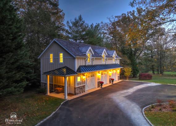 Aerial twilight photo of 21' x 43' 3-Car Garage in Wayne PA with gym and living space