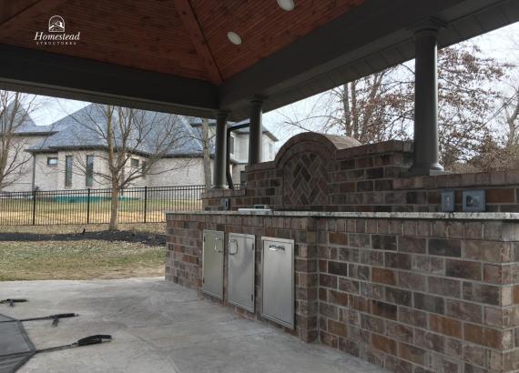 Brick bar with stainless steel appliances