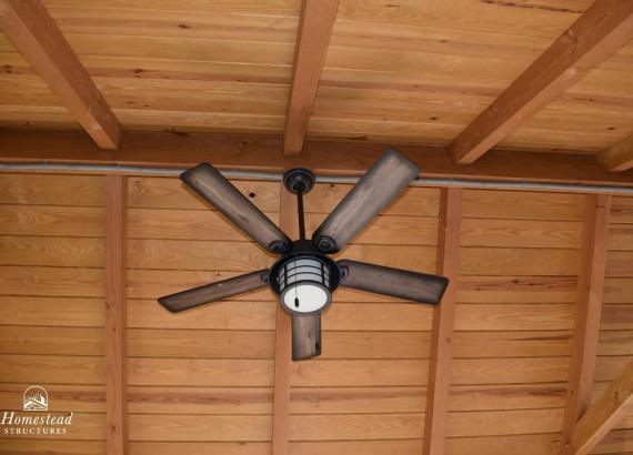 Ceiling view of 12x25 Timber Frame pavilion with ceiling fan & light combo