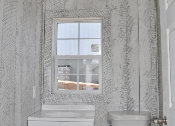 Finished bathroom with Etchwood panel walls in Siesta