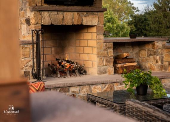 Stone fireplace with wood storage