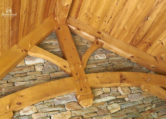 Timber Frame Rafters & Gable with Stone Wall