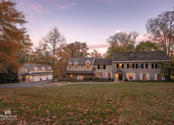 Exterior Twilight photo of 21' x 43' 3-Car Garage in Wayne PA with 2nd floor Gym & Living Space